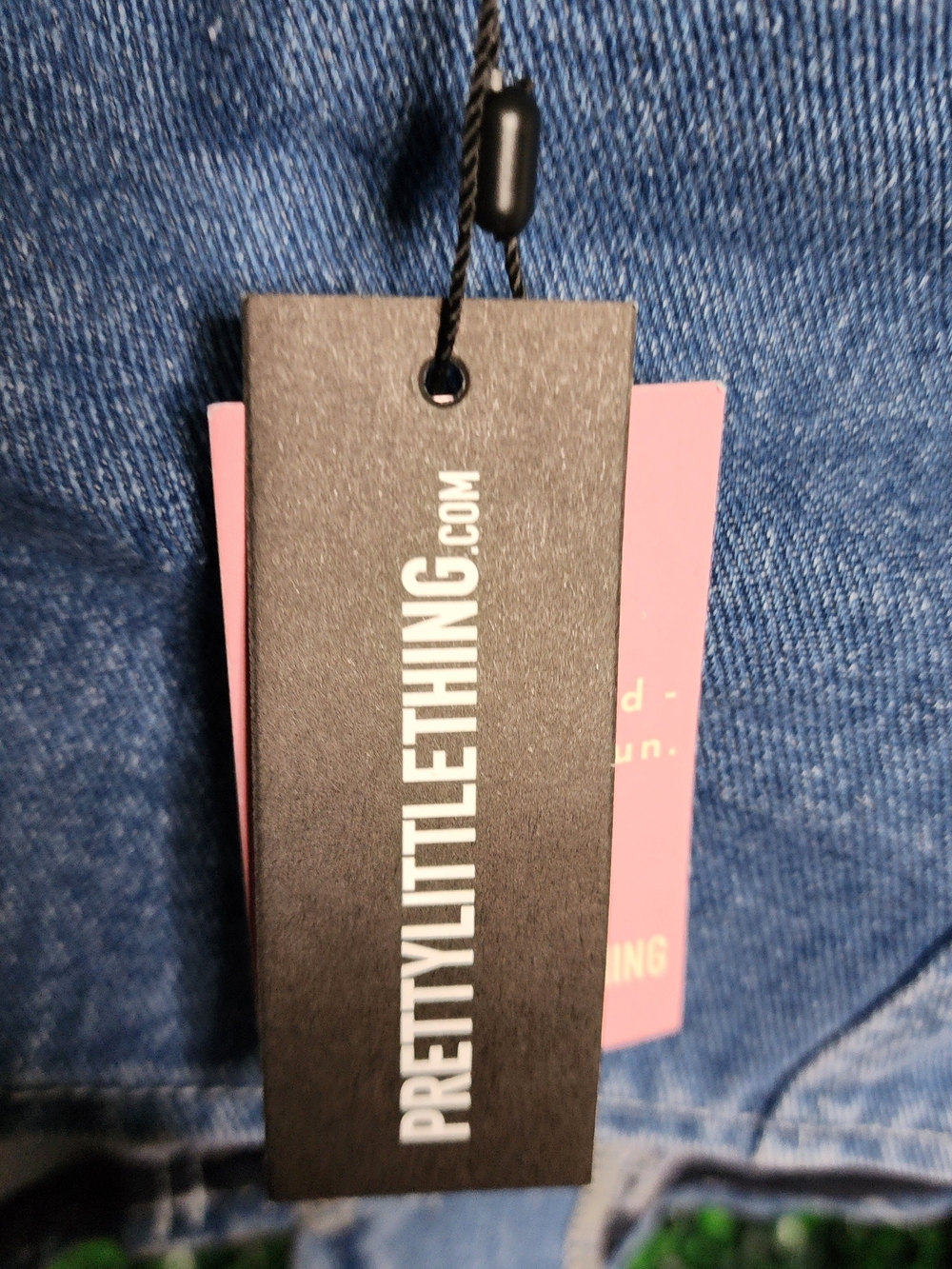 PrettyLittleThing Black and Pink Crop Top Tag Detail